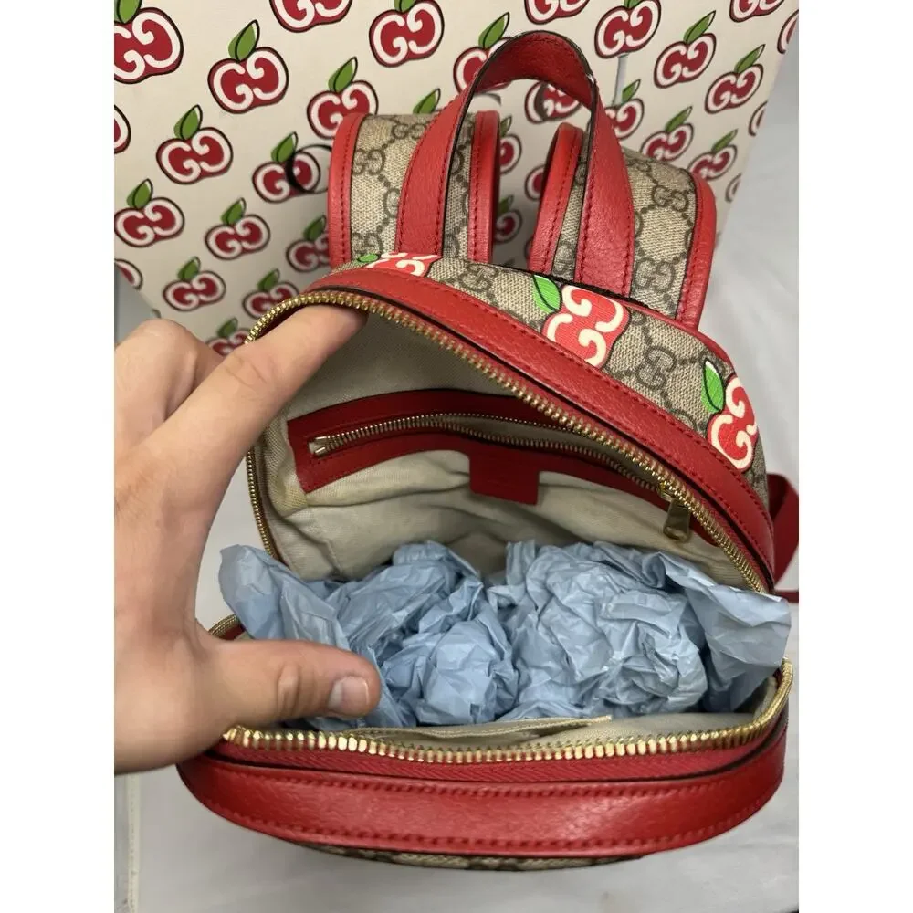 Gucci GG Supreme Canvas Apple Monogram Backpack